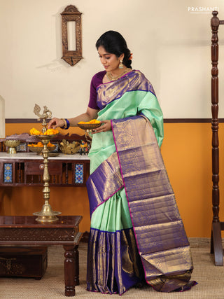 Teal-Blue Pure kanchipuram silk saree with Allover zari weaves and long rich zari border