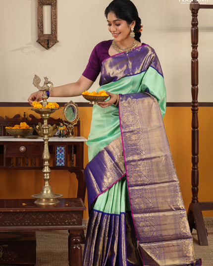 Teal-Blue Pure kanchipuram silk saree with Allover zari weaves and long rich zari border