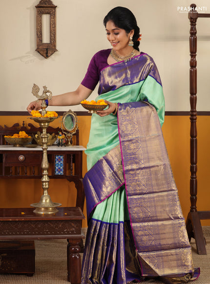 Teal-Blue Pure kanchipuram silk saree with Allover zari weaves and long rich zari border