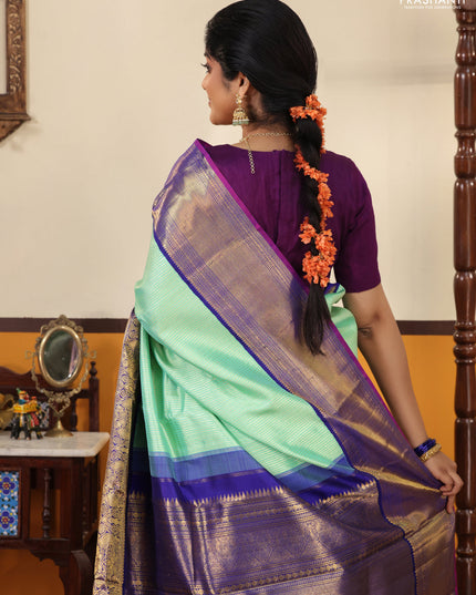 Teal-Blue Pure kanchipuram silk saree with Allover zari weaves and long rich zari border