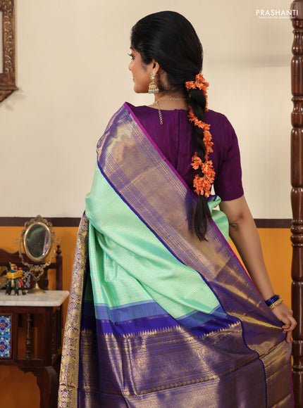 Teal-Blue Pure kanchipuram silk saree with Allover zari weaves and long rich zari border
