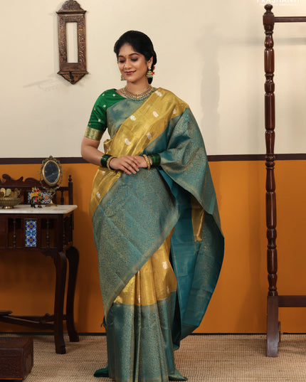 Gold-Peacock Green Pure Tissue Kanchipuram Silk Saree With Silver zari buttas & Long rich zari border