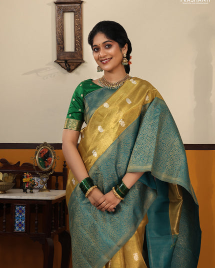 Gold-Peacock Green Pure Tissue Kanchipuram Silk Saree With Silver zari buttas & Long rich zari border