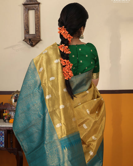 Gold-Peacock Green Pure Tissue Kanchipuram Silk Saree With Silver zari buttas & Long rich zari border