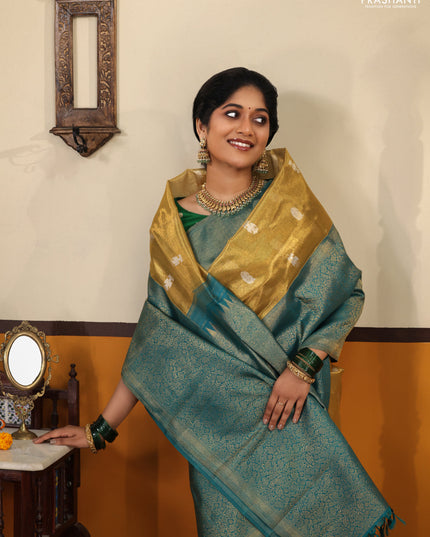 Gold-Peacock Green Pure Tissue Kanchipuram Silk Saree With Silver zari buttas & Long rich zari border