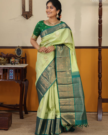 Pista green-Peacock blue Pure kanchipuram silk saree with zari woven buttas & Long rich zari woven border