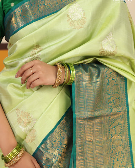 Pista green-Peacock blue Pure kanchipuram silk saree with zari woven buttas & Long rich zari woven border