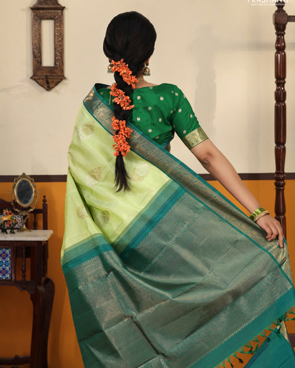 Pista green-Peacock blue Pure kanchipuram silk saree with zari woven buttas & Long rich zari woven border