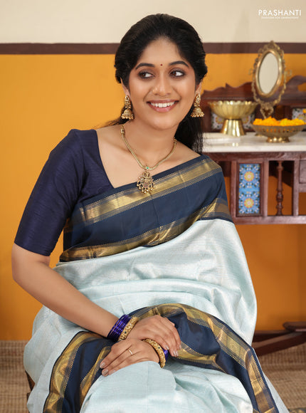 Pastel blue-Navy blue Pure Kanchipuram Silk Saree With allover zari woven brocade weaves and Reattapet zari woven border