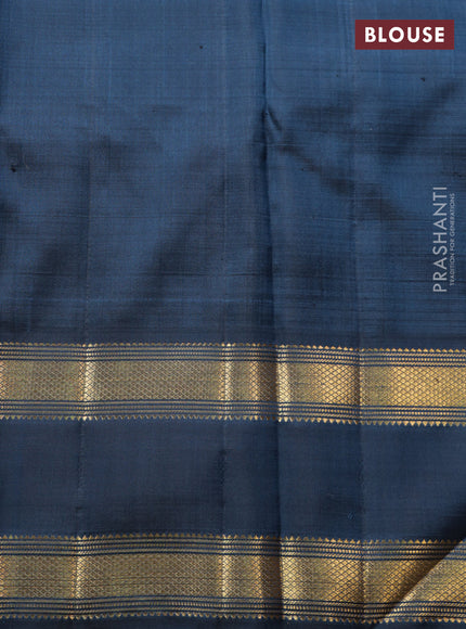 Pastel blue-Navy blue Pure Kanchipuram Silk Saree With allover zari woven brocade weaves and Reattapet zari woven border