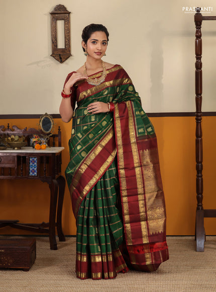 Green-Maroon Pure kanchipuram Silk Saree With Allover zari checks & buttas and rettapet zari woven border