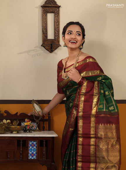 Green-Maroon Pure kanchipuram Silk Saree With Allover zari checks & buttas and rettapet zari woven border