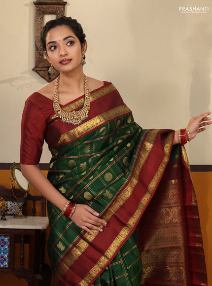 Green-Maroon Pure kanchipuram Silk Saree With Allover zari checks & buttas and rettapet zari woven border