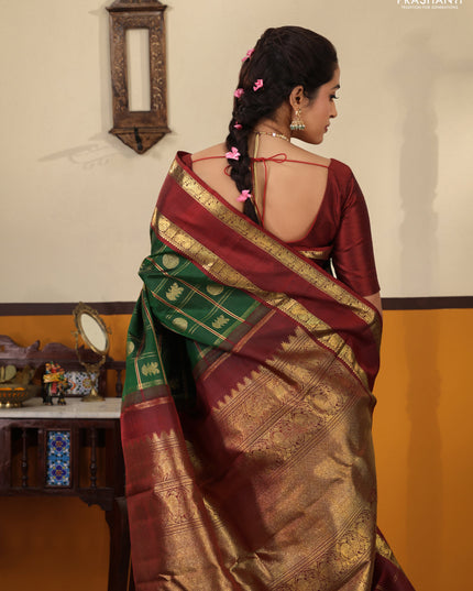 Green-Maroon Pure kanchipuram Silk Saree With Allover zari checks & buttas and rettapet zari woven border
