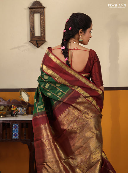Green-Maroon Pure kanchipuram Silk Saree With Allover zari checks & buttas and rettapet zari woven border