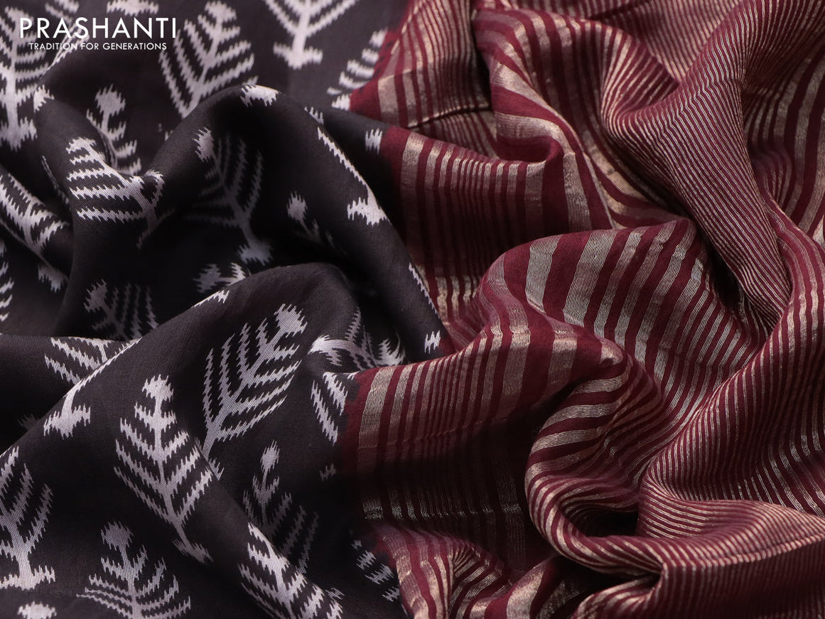Semi gadwal saree black and maroon with allover ikat butta weaves and zari woven border