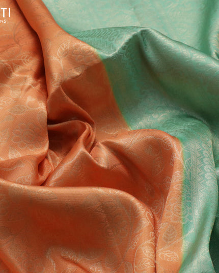 Banarasi softy silk saree pale orange and pastel green with allover silver zari woven brocade weaves and silver zari woven border