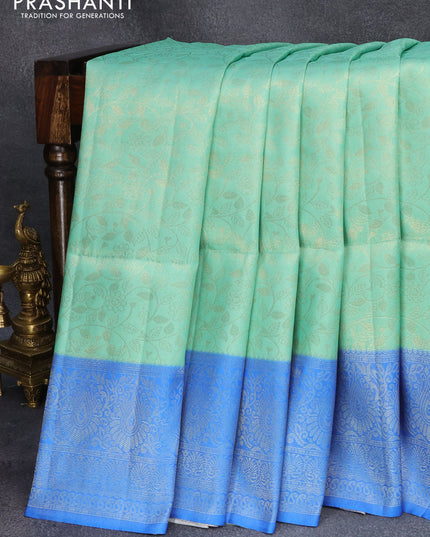 Banarasi softy silk saree teal green and blue with allover silver zari woven brocade weaves and silver zari woven border