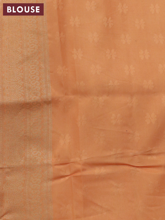 Banarasi softy silk saree light blue and pale orange with allover silver zari woven brocade weaves and silver zari woven border