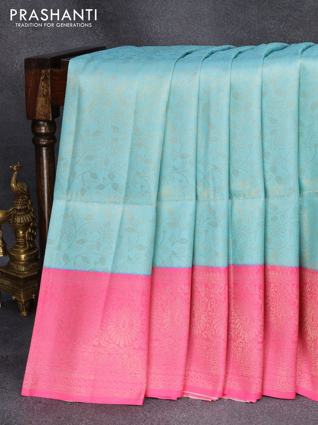 Banarasi softy silk saree light blue and light pink with allover silver zari woven brocade weaves and silver zari woven border