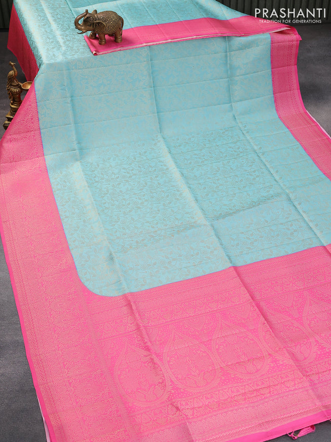 Banarasi softy silk saree light blue and light pink with allover silver zari woven brocade weaves and silver zari woven border