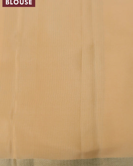 Pure mysore silk saree pale orange with allover self emoss and zari woven border