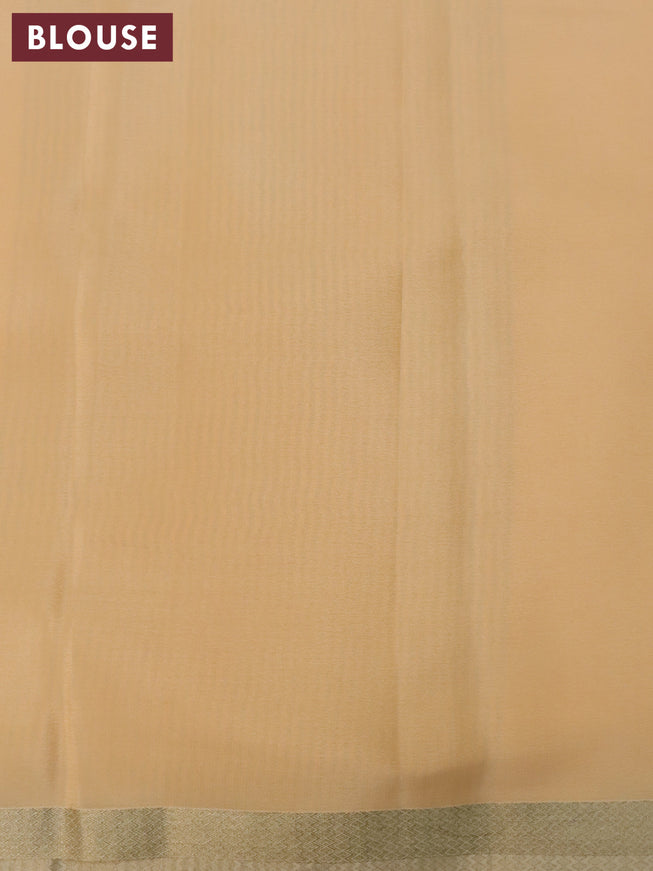 Pure mysore silk saree pale orange with allover self emoss and zari woven border