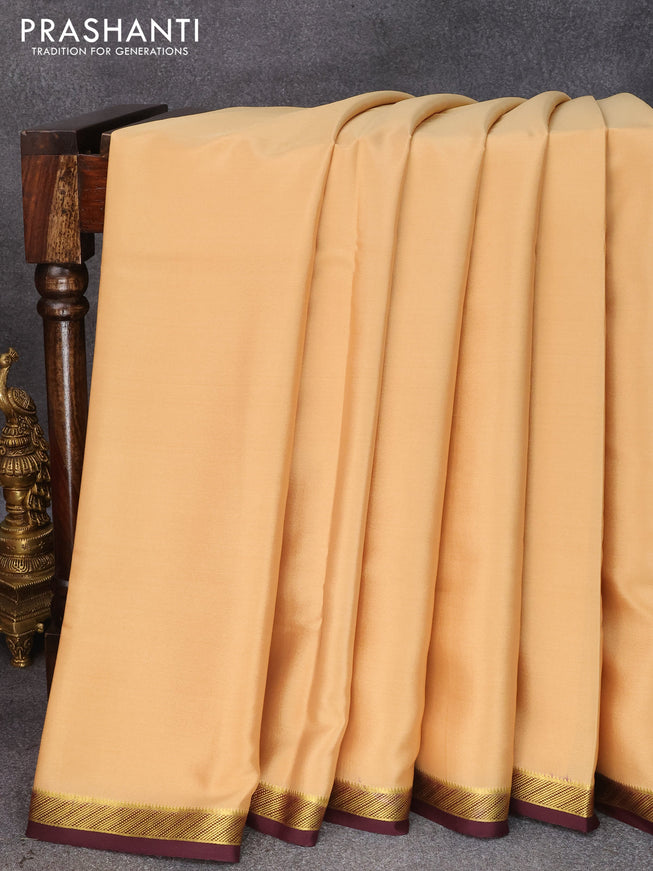 Pure mysore silk saree sandal and coffee brown with plain body and small zari woven border