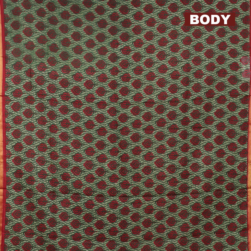 Mul cotton saree green shade with allover leaf butta prints and small zari woven border