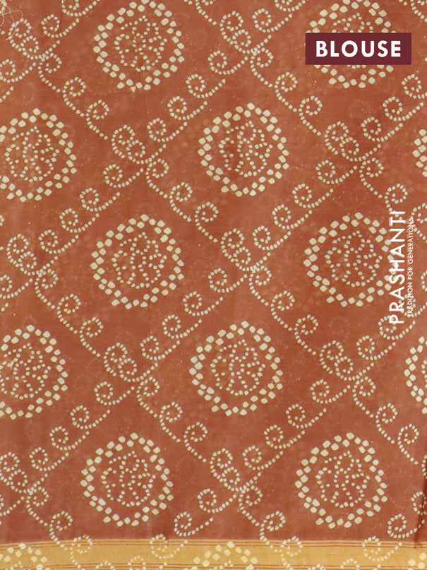Mul cotton saree dark mustard with allover ajrakh prints and small zari woven border