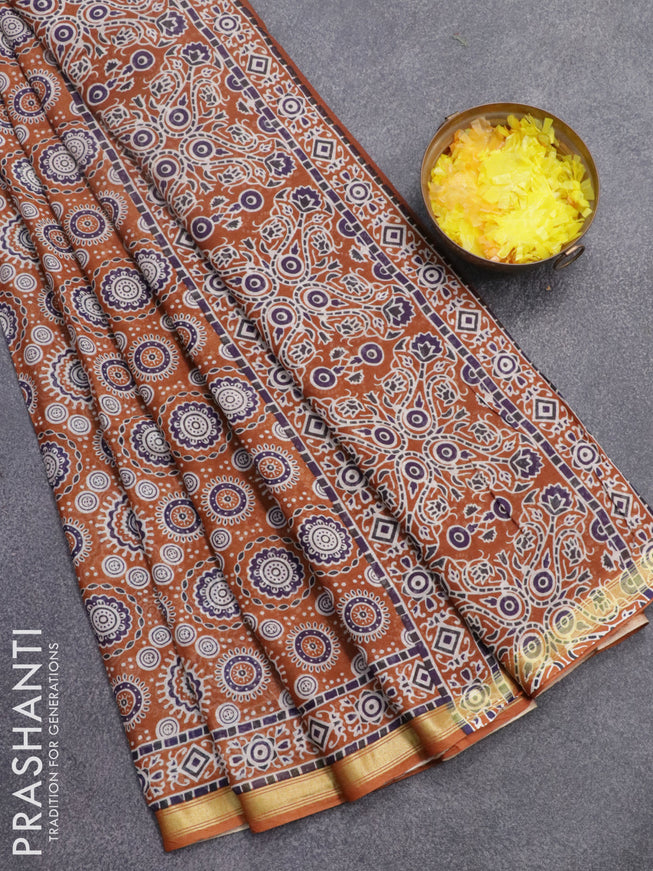 Mul cotton saree mustard shade with allover ajrakh prints and small zari woven border