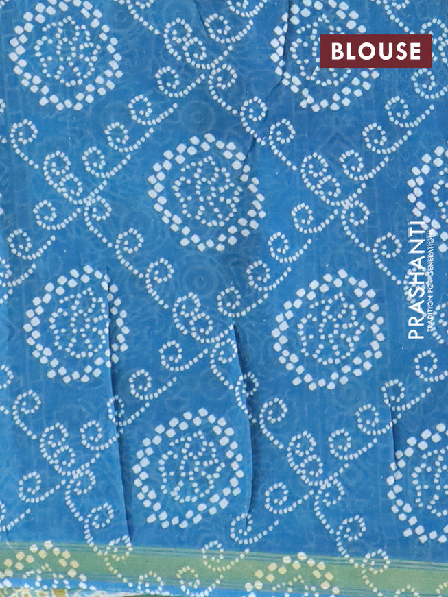 Mul cotton saree cs blue with allover ajrakh prints and small zari woven border