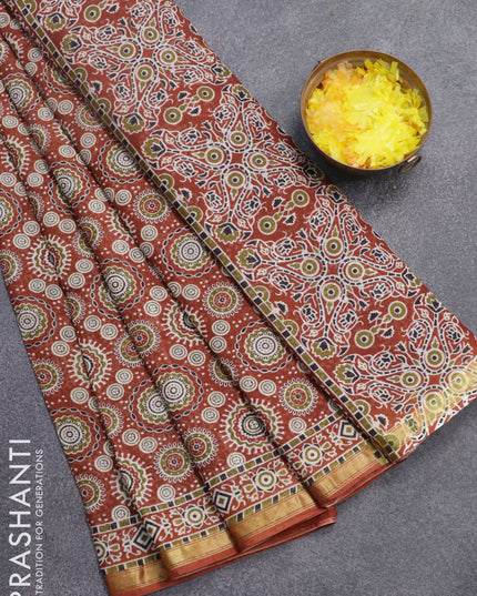 Mul cotton saree rust shade with allover ajrakh prints and small zari woven border