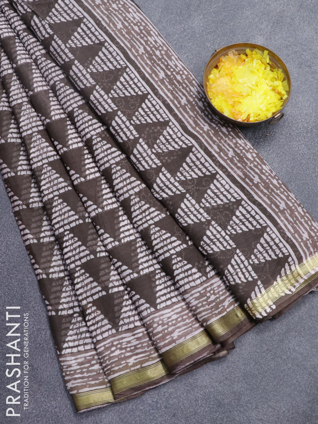 Mul cotton saree grey shade with allover geometric butta prints and small zari woven border