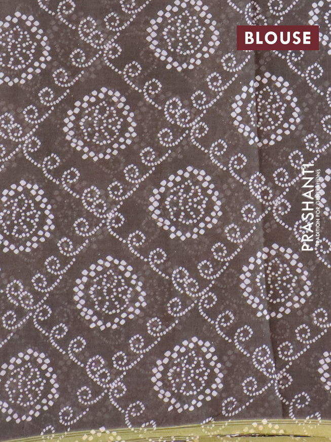 Mul cotton saree grey shade with allover geometric butta prints and small zari woven border