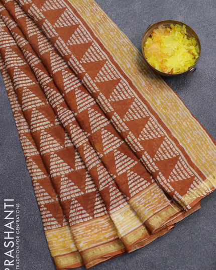 Mul cotton saree rustic orange with allover geometric butta prints and small zari woven border