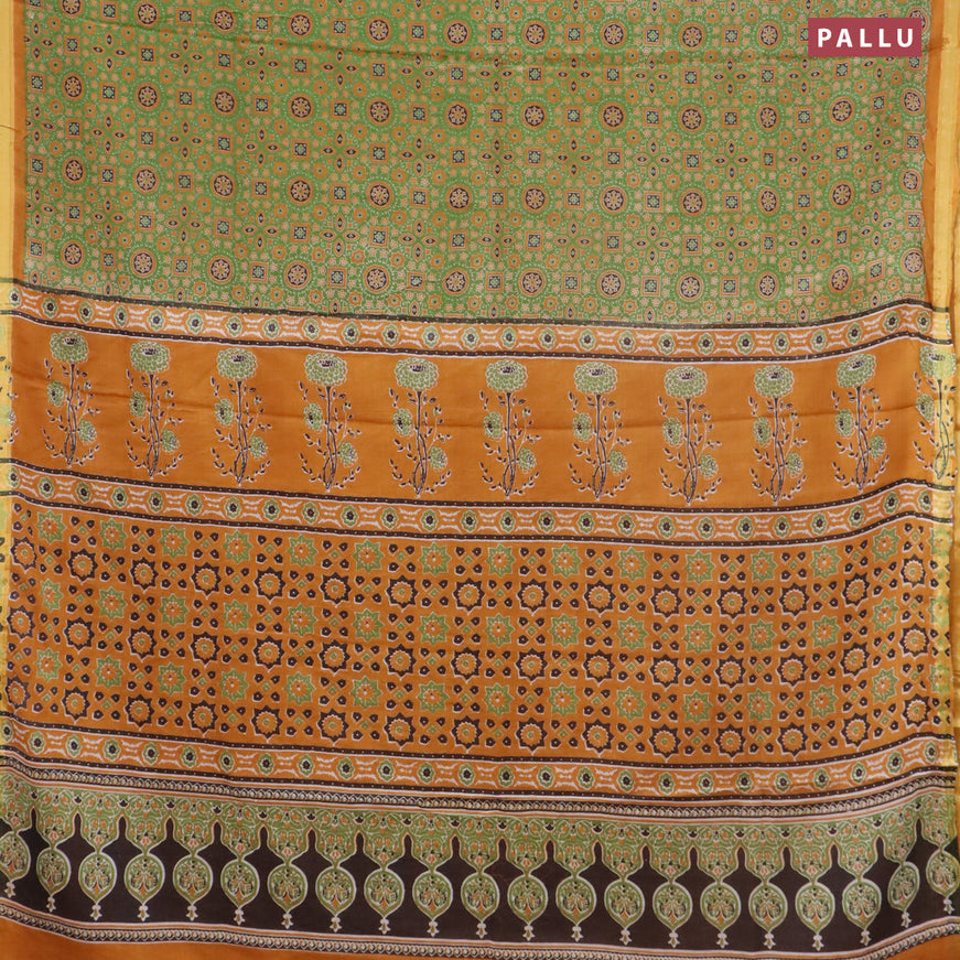 Mul cotton saree green and mustard yellow with allover ajrakh prints and small zari woven border