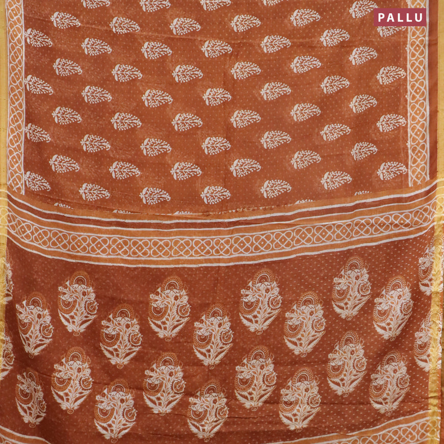 Mul cotton saree dark mustard with allover butta prints and small zari woven border