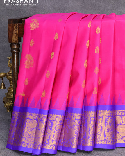 Pure gadwal silk saree pink and blue with zari woven buttas and temple design annam zari woven border