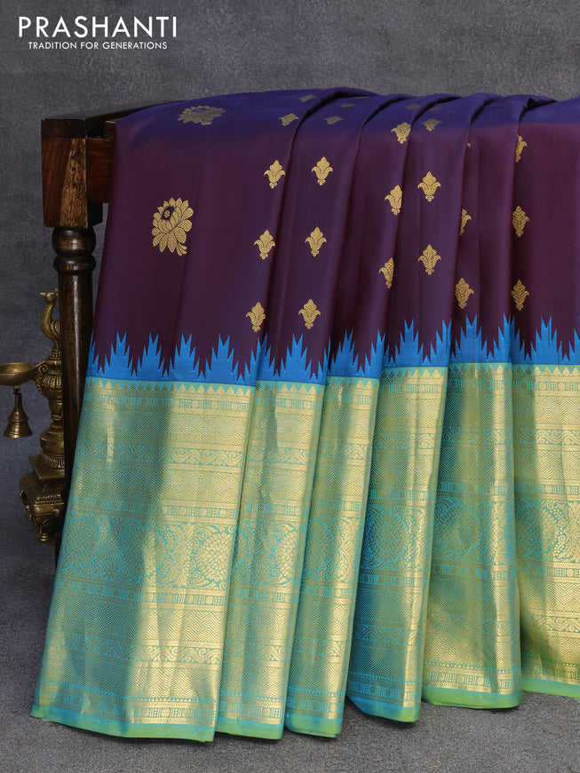 Pure gadwal silk saree deep jamun shade and teal blue with zari woven buttas and temple design long zari woven border