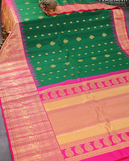 Pure gadwal silk saree green and pink with zari woven buttas and temple design long zari woven border