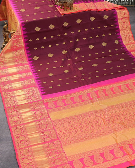 Pure gadwal silk saree deep maroon and dual shade of pinkish orange with zari woven buttas and temple design long zari woven border