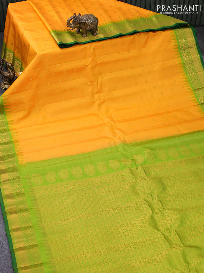 Pure gadwal silk saree mango yellow and light green with zari woven buttas and temple design zari woven border