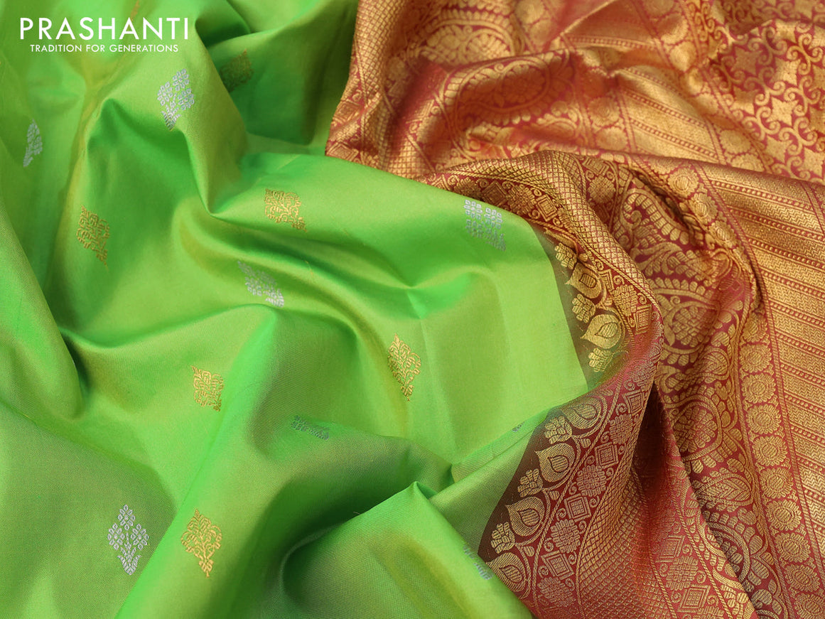 Pure gadwal silk saree light green and rust shade with zari woven buttas and temple design zari woven border