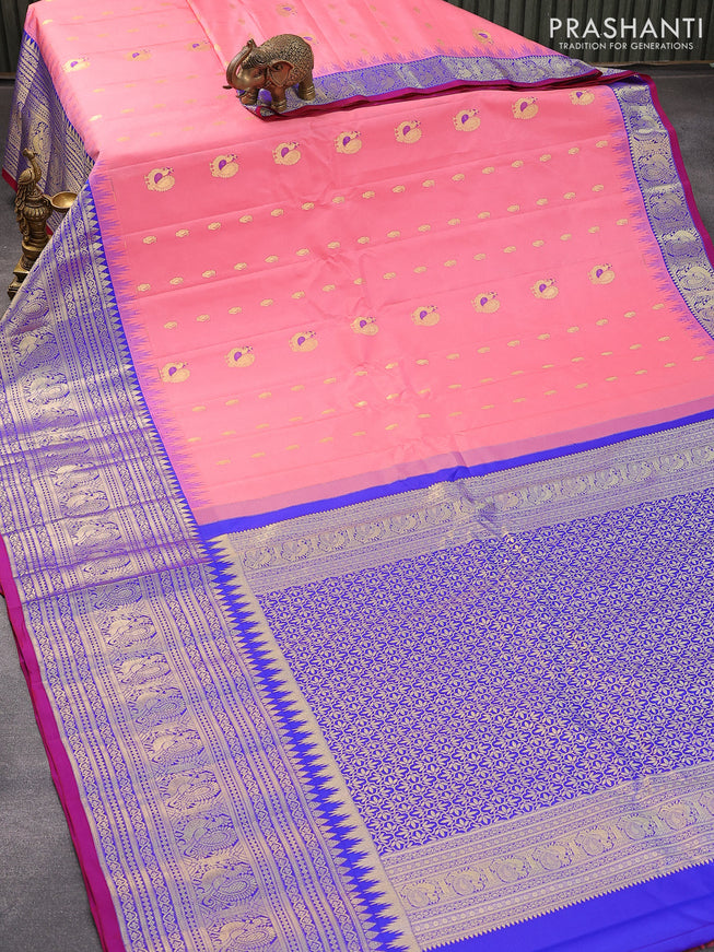 Pure gadwal silk saree peach pink and blue with zari woven buttas and temple design long zari woven border
