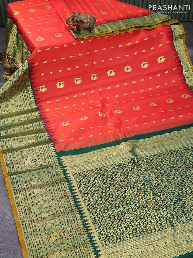 Pure gadwal silk saree orange and green with zari woven buttas and temple design long zari woven border