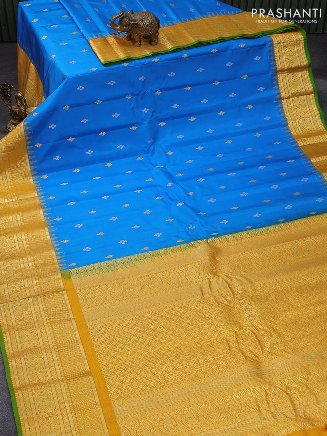 Pure gadwal silk saree cs blue and yellow with zari woven buttas and long zari woven border