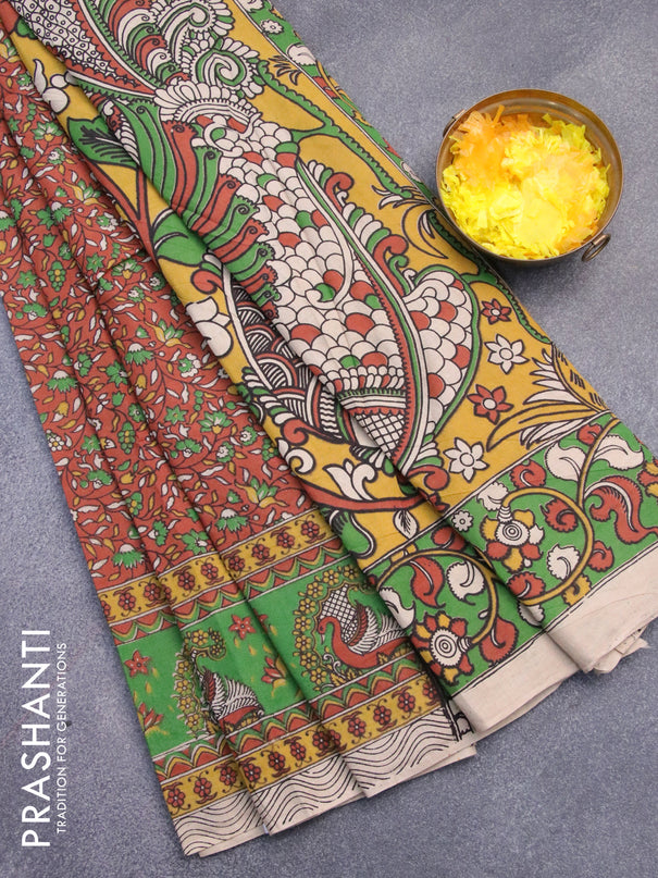 Kalamkari cotton saree rust shade and light green with allover prints and printed border