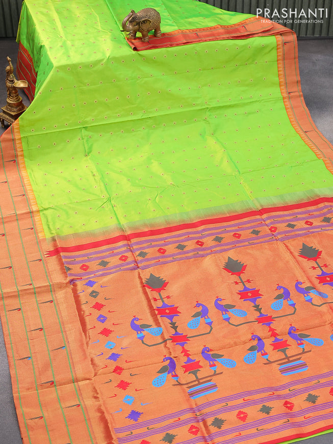 Pure paithani silk saree light green and red with allover floral zari woven buttas and zari woven muniya butta border