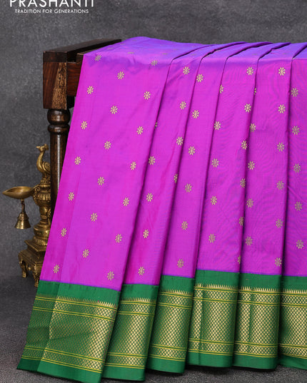 Pure paithani silk saree purple and green with allover floral zari woven buttas and zari woven border
